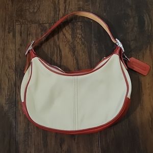 Nwot Coach handbag from early 2000s. Brand new condition.